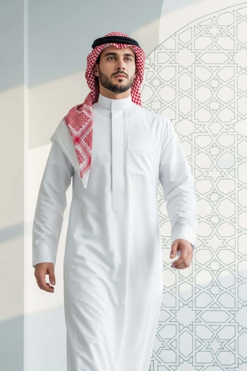 A man wearing the stylish Saudi Thobe from the Stellar Edition. 5