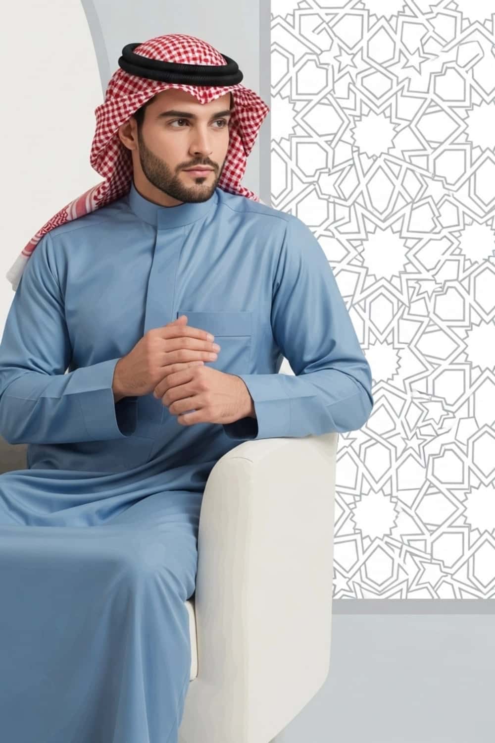 A man wearing the calm and confident Powder Blue Saudi Thobe. 3