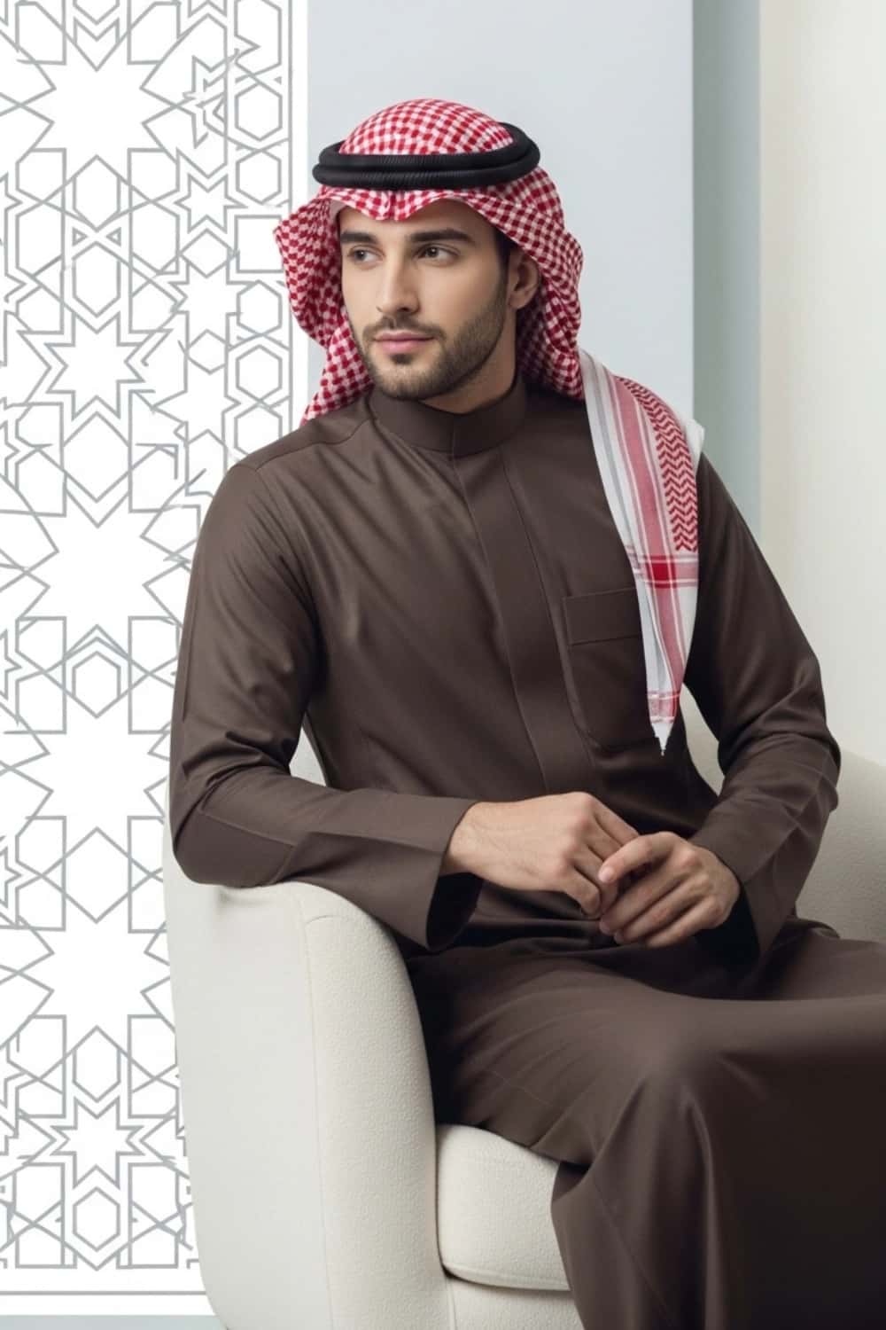 A man wearing the warm and rich Dark Brown Winter Saudi Thobe. 3
