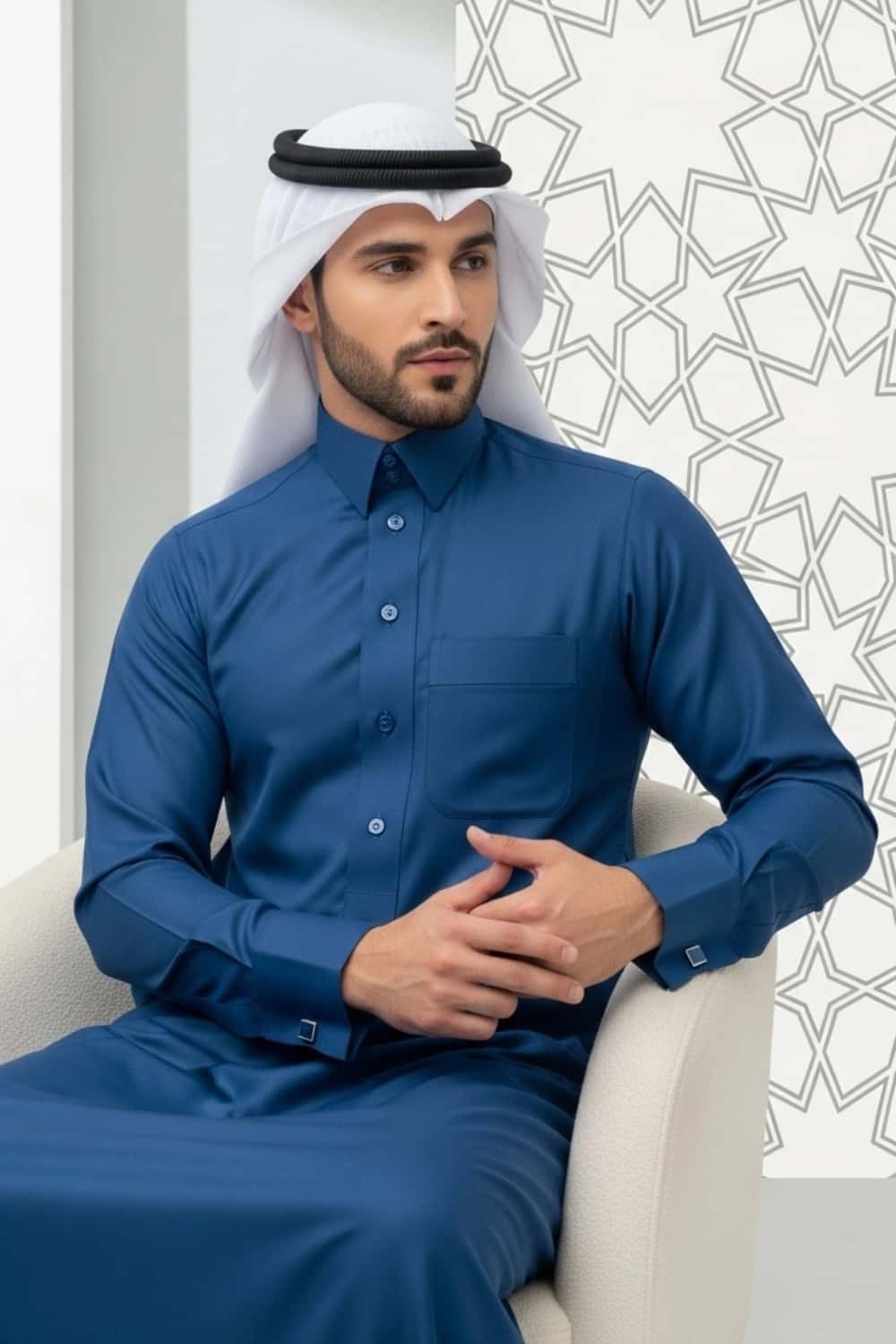 A man wearing the distinct Blue Qatari Thobe from the Stellar Edition. 2