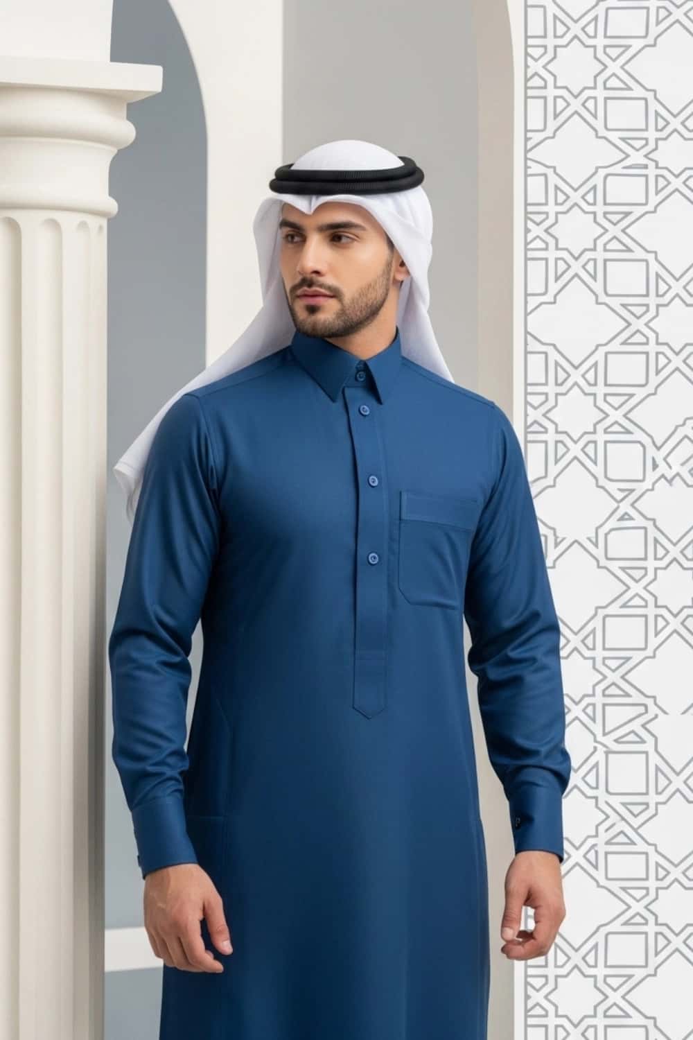 A man wearing the distinct Blue Qatari Thobe from the Stellar Edition. 4