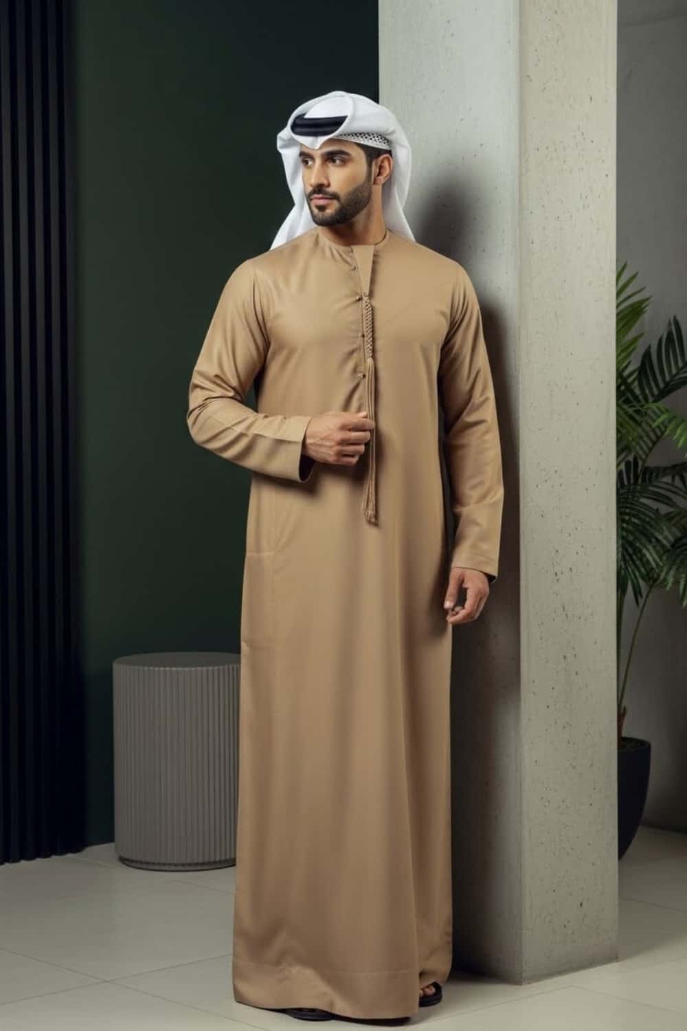 Man wearing Camel Montgomery Wool Kandora showcasing the warm noble heritage tone and luxurious English wool drape from Shabab al Yola Winter Collection 3
