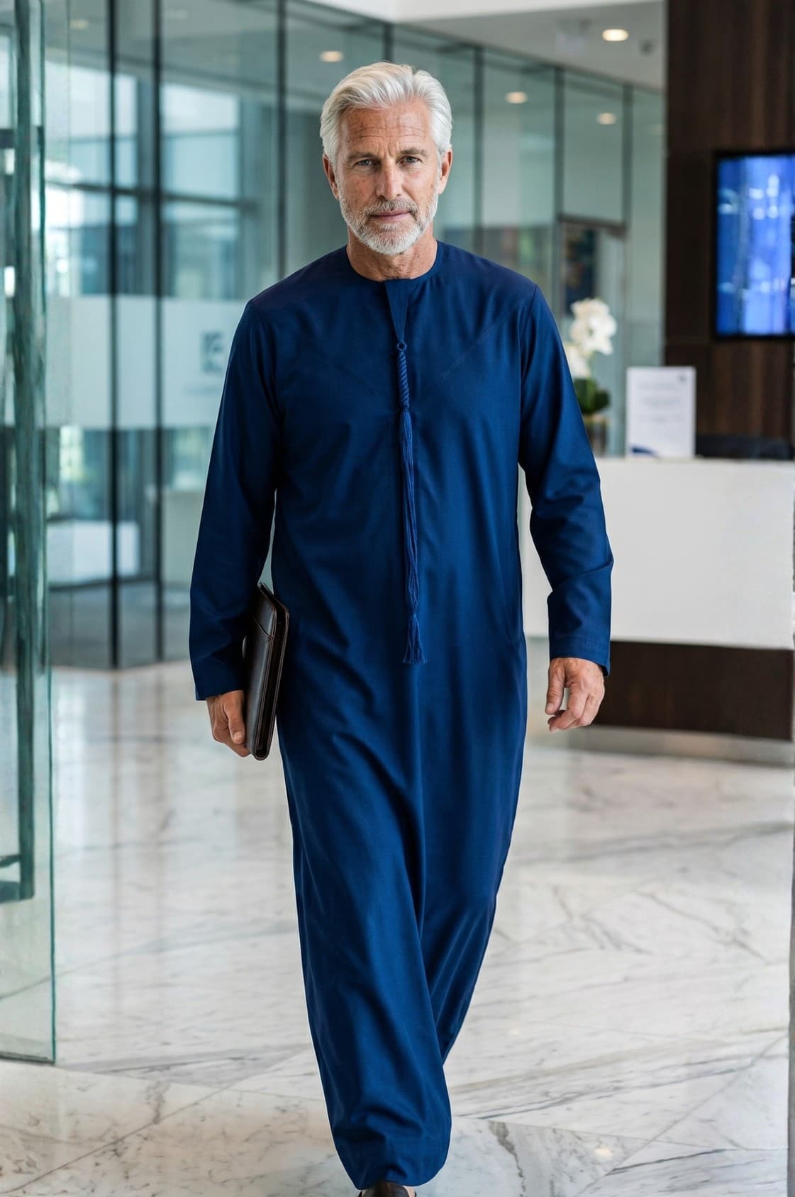 Distinguished senior executive wearing a royal navy blue winter kandora at a luxury Abu Dhabi evening event, commanding presence and authority. 1