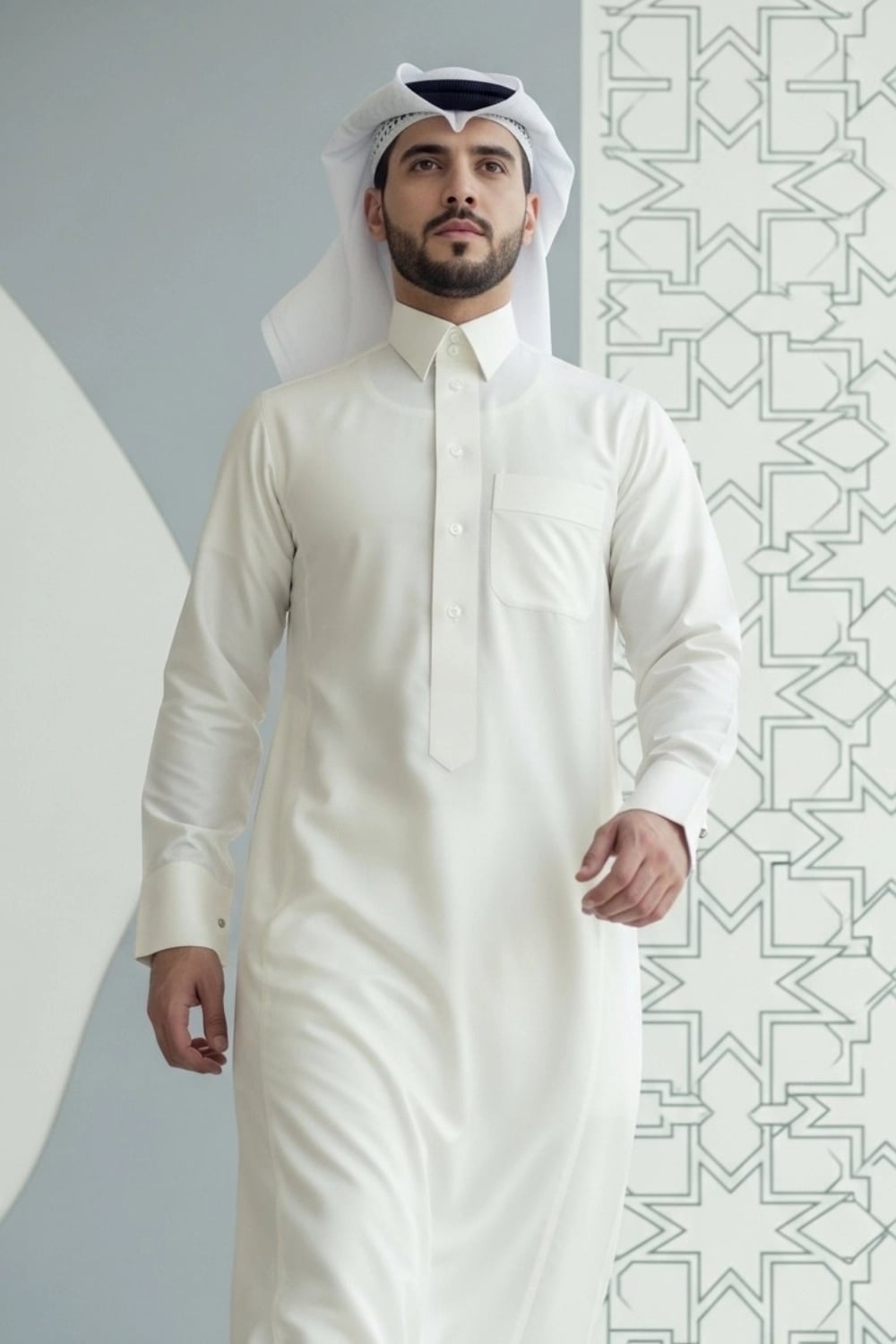 A man wearing the sharp and sophisticated Cream Qatari Thobe. 1