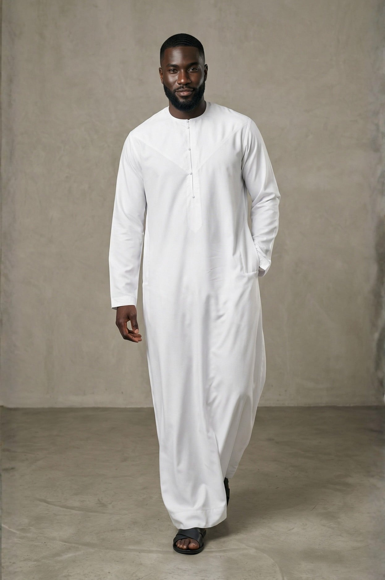 Sophisticated international businessman wearing a crisp white premium kandora in a luxury Abu Dhabi setting, exuding confidence and elegance. 1